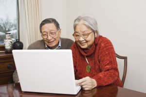 iStock_000008311192Large couple on computer iStock_000008311192Large couple on computer