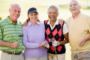 Portrait Of Four Friends Enjoying A Game Golf Portrait Of Four Friends Enjoying A Game Golf